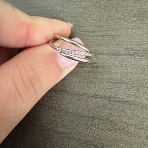 Elegant Silver Crossover Ring